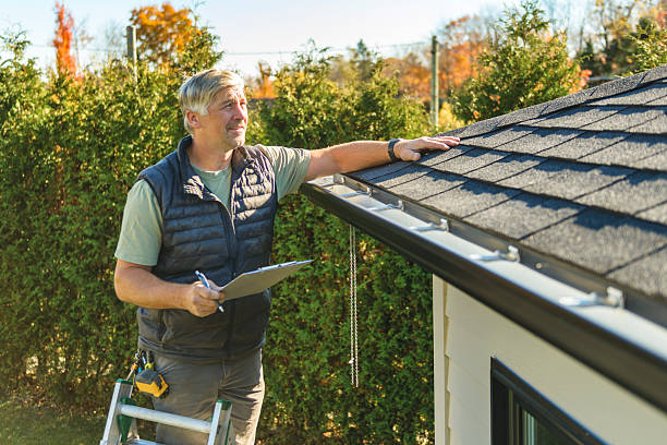 Professional Hail Damage Roof Repair technician working in Thatcher, AZ
